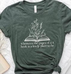 Book lover cotton graphic tshirt. Cotton and vinyl tshirt. Message with color of shirt and choice of graphic color; black or white. Available in numerous shirt colors. Please message with questions and special requests. Additional vinyl colors are available upon request. Tea And Books, Bella Canvas Tees, High Quality T Shirts, Teacher Shirts, Tshirt Colors, Bella Canvas, Ivy, Book Lovers