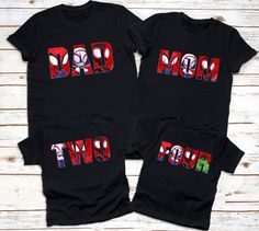 two black shirts with the word mom and two kids's t - shirts on them