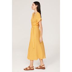 Yellow cotton (100% Cotton). Wrap. Short sleeves. V-neck. Tie closure. 50.5" from shoulder to hemline. Imported. V-neck Maxi Dress For Daytime, Chic V-neck Maxi Dress For Daytime, Summer V-neck Workwear Dress, Daytime Linen V-neck Dress, Yellow Relaxed Fit V-neck Dress, Yellow V-neck Relaxed Fit Dress, Summer V-neck Cotton Midi Dress, Spring Cotton V-neck Dress, Casual Cotton V-neck Midi Dress