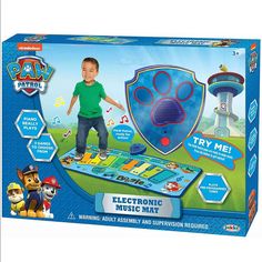 the electronic music mat has paw patrol on it's front and back cover, as well as an image of a dog