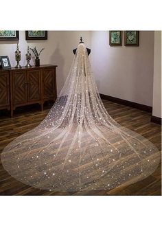 a wedding veil with stars on it