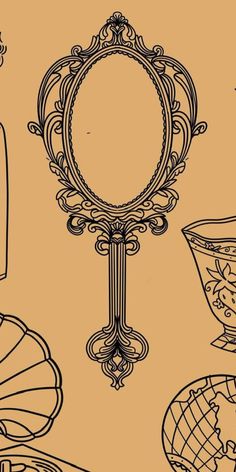 an old fashioned mirror and other decorative objects on a beige background with black lines in the middle