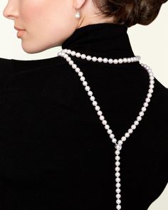 This exquisite pearl necklace features 8.0-8.5mm AAA quality Japanese white Akoya pearls hand picked for their radiant luster. 
The pearls are strung and double knotted on the finest silk thread. The necklace is affixed with an adjustable 14K gold & diamond encrusted clasp that can be placed on any pearl on the strand for easy customization. Elegant Lariat Pearl Necklace For Formal Occasions, Classic Lariat Pearl Necklace, Classic Pearl Chain Lariat Necklace For Formal Occasions, Elegant Pearl White Lariat Necklace, Classic Formal Lariat Necklace With Pearl Drop, Formal Pearl Lariat Necklace, Classic Formal Lariat Necklace With Pearl Pendant, Elegant Formal Lariat Necklace With Pearl Charm, Formal Elegant Lariat Necklace With Pearl Charm