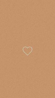 a white heart in the middle of a brown background with a small outline on it