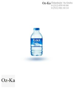 a bottle of water sitting on top of a white table next to an advertisement for the company