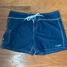 Pelagic Offshore Shorts. Perfect For The Beach! Never Worn. Navy Bottoms With Built-in Shorts For Beach, Navy Swim Trunks With Built-in Shorts For Beach, Beachy Shorts For Swimming, Blue Summer Beach Shorts, Navy Shorts For Pool And Beach Season, Navy Shorts For Beach Season, Sporty Blue Beach Shorts, Navy Swimwear With Built-in Shorts For Beach, Navy Beach Bottoms With Built-in Shorts