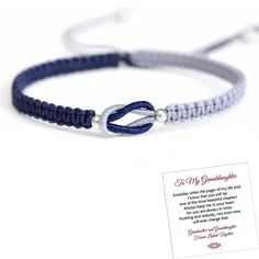 a blue and white bracelet with an inspirational quote on the front, along with a message from someone else