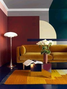 a living room with colorful walls and furniture