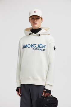 Designed to complement an active lifestyle, this hoodie is crafted from plush cotton fleece. The hooded sweatshirt is embellished with logo details. White Logo Hooded Sweatshirt, White Hooded Logo Sweatshirt, White Sporty Logo Hoodie, Athleisure Hoodie Sweatshirt With Logo Detail, White Hooded Sweatshirt With Logo, White Sporty Hoodie With Logo, White Logo Hoodie For Winter, Logo Hoodie Sweatshirt In Athleisure Style, Winter Sporty Hoodie With Logo Detail