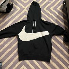 Nike Men’s Hoodie In Black And White. New Without Tags! Nike Sweatshirt With Logo For Streetwear, Nike Athleisure Hoodie With Logo Print, Nike Long Sleeve Hoodie With Logo Print, Nike Crew Neck Hoodie For Streetwear, Nike Crew Neck Hoodie With Logo Print, Nike Urban Crew Neck Hoodie, Nike Urban Hoodie With Crew Neck, Nike Sporty Hoodie With Logo Print, Nike Black Hoodie With Logo Print