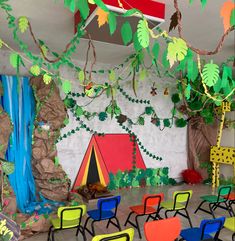 an indoor classroom with colorful chairs and decorations