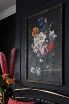 A black painting with white, yellow, red and blue flowers and a gold frame. Elegant Pictures, Lounge Dining Room, Rose Wall Art, Boho Prints, Boho Beautiful, Wall Art Frame, Lay Me Down, Rose Frame, Rose Wall