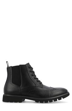 Elevate your work-to-weekend look in this refined faux-leather boot updated by a brogue-detailed wingtip and a heavily lugged sole. 5" shaft Synthetic upper/textile lining/rubber sole Imported Black Wingtip Lace-up Boots For Fall, Casual Wingtip Lace-up Boots For Work, Classic Black Lace-up Boots For Work, Wingtip Lace-up Boots For Business In Fall, Business Wingtip Lace-up Boots For Fall, Classic Black Chelsea Boots With Brogue Detailing, Fall Business Wingtip Lace-up Boots, Black Brogue Lace-up Ankle Boots, Fitted Wingtip Work Boots