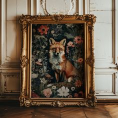 an ornate gold frame with a painting of a fox in the middle and flowers around it