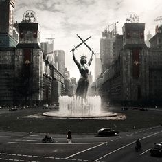 a statue in the middle of a city with water spouting out of it