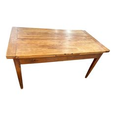 a wooden table with two legs and a small drawer on the top, against a white background