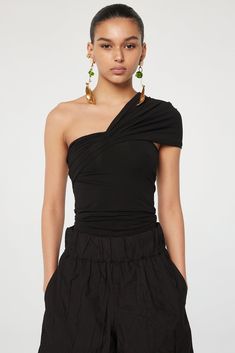 Kyo Tube Top - Black | The Line by K Summer Evening Off-shoulder Ruched Top, Summer Evening Ruched Off-shoulder Top, Ruched One-shoulder Top For Night Out In Summer, Summer One-shoulder Ruched Top For Night Out, Summer Ruched One Shoulder Top For Night Out, Stretch Off-shoulder Top For Summer Evenings, Ruched Off-shoulder Top For Summer Nights Out, Chic Ruched One Shoulder Top For Summer, Summer Evening Bandeau Top