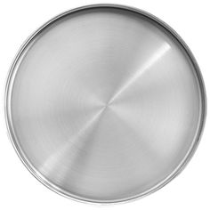 an empty metal plate on a white background