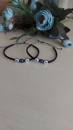 The Couples Bracelet Set consists of two bracelets, colors* of your choosing and 2 Letter Beads and 1 Evil Eye Bead for each bracelet. All bracelets are made with  waxed thread, which is waterproof and very long-lasting. I do it with love for your best friend, mother and daughter, father and son, and other loved ones. Handmade Black Friendship Bracelets For Gift, Handmade Black Friendship Bracelets Gift, Personalized Bohemian Friendship Bracelets For Gifts, Adjustable Braided Bracelets, Hand-strung, Gift, Adjustable Hand-strung Braided Bracelets As Gifts, Handmade Spiritual Bracelets For Best Friend, Handmade Round Beads Jewelry As Best Friend Gift, Spiritual Handmade Bracelets For Best Friend, Handmade Adjustable Spiritual Name Bracelet