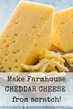 some cheese is sitting on top of a wooden board with the words make farmhouse cheddar cheese from scratch