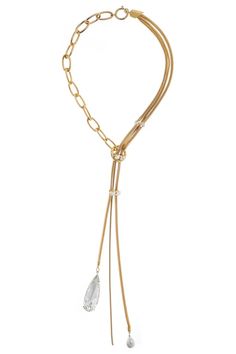 The Precious Drop Necklace in Gold offers a distinctive and stylish appearance, making it the ideal addition to any evening look. Wear it with a plunging necklace and complementary items from the same collection for an elegant combination. Made in Italy Crystals Pearls Bronze Metal 18K Gold Plated Necklace Length, 18" + 2" Extension Elegant Drop Necklaces With Jewels, Elegant Drop Jewel Necklaces, Elegant Jeweled Pendant Drop Necklace, Elegant Formal Necklace With Detachable Pendant, Elegant Formal Necklaces With Detachable Pendant, Chic Yellow Gold Necklaces For Evening, Elegant Diamond Necklace With Jewels For Party, Chic Formal Necklace With Adjustable Chain, Chic Formal Necklaces With Adjustable Chain