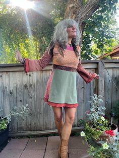 This is an original, one of a kind, Zasra design. It is a funky, handmade, patchwork, jersey  tunic dress. This design is a baby doll tunic, cleopatra neckline,  full length bell  sleeves, with a slight aline fit.  It can be worn with leggings, skinny jeans, tights, or solo as a dress... The colors of this groovy mini dress is ,country clay, sage, rust, bark brown, tangerine, small pops of bubblegum pink....  The prints are an eclectic mix of solids, mandala, paisley, jacquard.  Measurements~ XS Fitted Bohemian Patchwork Dress, Fitted Hippie Dress With Patchwork, Hippie Fitted Patchwork Dresses, Fitted Hippie Patchwork Dresses, Hippie Tunic Fall Dress, Hippie Tunic Dress For Fall, Bohemian Brown Dress With Patchwork, Bohemian Mini Dress With Patchwork, Bohemian Mini Length Patchwork Dress