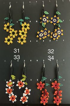 beaded flower earrings are displayed on a black board with white beads and numbers in the background