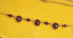 Vintage Bohemian garnet necklace, gilded 900 silver setting. Length 44.5 cm (17.5"), the cluster 9 cm x 1.1 cm (3.5" x 0.4") Hallmarked: 900 for European silver, G2 and rabbit mark for Czech Bohemian garnet Weight 5.5 grams Excellent vintage condition Will be delivered by tracked and signed mail. Thank you for looking. Please see my other items. Garnet Necklace, Silver Chain Necklace, Vintage Bohemian, Garnet, Silver Chain, Necklace Etsy, Jewelry Necklace Pendant, Beauty Book, Chain Necklace