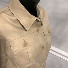 Jones New York Signature Khaki Jacket Size S Nwot Exceptionally Stylish! Dress It Up Or Down. Great Detailing Includes 4 Pockets, Logo Buttons, Gold Buckles. Waist Can Be Cinched Or Worn More Loosely. Armpit To Armpit 18 1/2” Waist 15-17” Depending On Cinch Hip 19” Sleeve Length 24” Length Hps 24” Classic Fitted Khaki Utility Jacket, Classic Cream Outerwear With Flap Pockets, Beige Utility Jacket With Snap Buttons For Work, Beige Leather Jacket With Button Closure For Work, Beige Fitted Utility Jacket For Work, Fitted Beige Utility Jacket For Work, Fitted Beige Outerwear With Snap Buttons, Khaki Utility Jacket With Snap Buttons For Workwear, Fitted Utility Jacket With Snap Buttons For Work