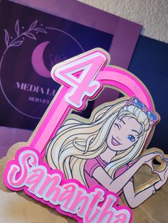 a pink and white birthday sign with a girl holding a cup in front of it