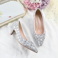 Category:Wedding Shoes,Pumps; Upper Materials:PU; Embellishment:Rhinestone,Crystal,Sparkling Glitter; Heel Type:Stiletto; Gender:Women's; Toe Shape:Pointed Toe; Type:Wedding Heels,Bridal Shoes,Bridesmaid Shoes; Style:Cute,Minimalism,Business,Sexy; Heel Height(inch):2-3; Outsole Materials:Rubber; Occasion:Party; Closure Type:Loafer; Pattern:Geometric,Polka Dot; Listing Date:12/14/2023; Production mode:Self-produce; 2024 Trends:Ladies Shoes Valentines Gifts; Foot Length:; Foot Width:; Size chart date source:Provided by Supplier. Wedding Shoes With Rhinestones And Round Toe, Banquet Wedding Shoes With Rhinestones And Round Toe, Closed Toe Heels With Rhinestones For Banquet, Wedding Heels With Bling And Pointed Toe, Bling Heels With Pointed Toe For Wedding, Silver Embellished Heels For Banquet, Wedding Shoes With Rhinestones For Banquet, Elegant Rhinestones Wedding Shoes For Banquet, Crystal Wedding Shoes With Rhinestones