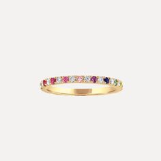 Details: This gorgeous, multicolor Rainbow & Diamond Eternity Band in 14k gold features pavé set color stones alternating with white diamonds all the way around creating an ombré effect. It is delicate and perfect for stacking with your favorite rings or even as an addition to any wedding ring stack. Shop the look: Honeycomb Band, Mini Mini Letter Chain Ring, and Mini Letter Ring Diamonds: 0.25 carats, G color, VS2 clarity Color Stones: Amethysts, Topaz, Ruby, and Sapphires Width: 1.5mm Availabl Elegant Rainbow Diamond Jewelry, Elegant 14k Gold Multi-stone Eternity Band, Luxury Yellow Gold Multi-stone Eternity Band, Luxury Yellow Gold Eternity Band With Multi-stone, Luxury Multi-stone Yellow Gold Eternity Band, 14k Gold Multi-stone Eternity Band, Gold Multi-stone Cubic Zirconia Eternity Band, Gold Multi-stone Diamond Eternity Band, Gold Diamond Multi-stone Eternity Band