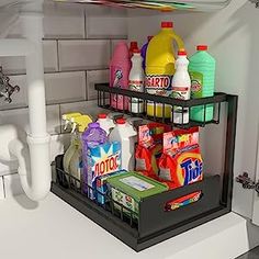 a shelf filled with lots of different types of detergent on top of a sink