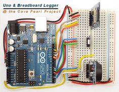 an uno and breadboard logger is shown with wires attached to the circuit board