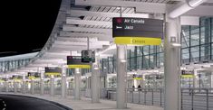 an empty airport terminal at night time