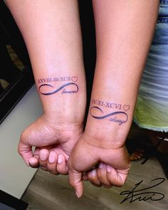 two people holding hands with tattoos on their arms that say, love and affection in cursive writing