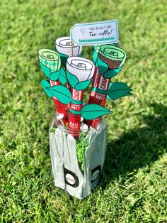 an arrangement of golf tees in a bag on the grass