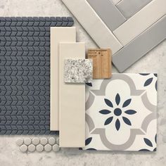 various tiles and accessories laid out on top of each other