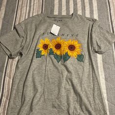 Never Worn. Perfect Condition. Casual Summer Tops With Sunflower Design, Spring Sunflower Design Top With Short Sleeves, Gray Floral Print Tops For Summer, Spring Gray Shirt With Graphic Print, Trendy Gray Spring Shirt, Casual Gray Tops With Floral Print, Spring Sunflower Design Short Sleeve Top, Trendy Spring Tops With Sunflower Print, Casual Gray Floral Print Tops