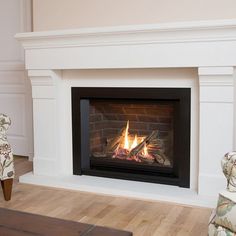 a fireplace with a fire burning in it