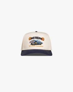 a white and blue hat with an image of a car in the center on it