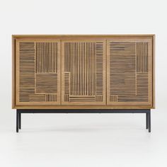 the sideboard is made out of wood and has an intricate design on it's sides