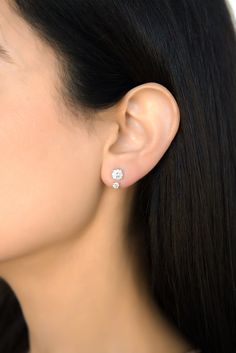 The Solitaire Drop Ear Jacket is a subtle statement-making addition to elevate your ear game and create unique looks. Handcrafted in solid 14 karat gold, this design can fit nicely with any of your studs and has four different adjustable lengths. Details: 14 Karat Gold Drop length: ~ 12.20 mm Diamond weight: approximately 0.16 ct Diamond Studs With Drops, Formal Yellow Gold Ear Climbers With Prong Setting, 14k Gold Ear Climbers For Anniversary With Prong Setting, Hypoallergenic Minimalist Diamond Earrings For Formal Occasions, Minimalist Formal Earrings With Tension Setting, Classic Ear Climbers For Anniversary, Elegant Hypoallergenic Rose Gold Ear Climbers, Classic Diamond Ear Climbers For Anniversary, Classic Yellow Gold Ear Climbers For Anniversary