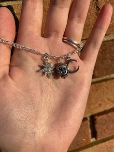 Charm bracelet with buddha, moon and star charms. Moon And Star, Wire Rings, Leaf Necklace, Monstera Leaf, Star Charms, Stone Earrings, Charm Bracelets, Pandora Charm Bracelet, Beautiful Rings