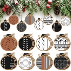 twelve christmas ornaments hanging from a tree