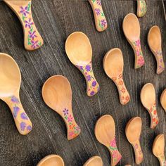 wooden spoons with designs painted on them