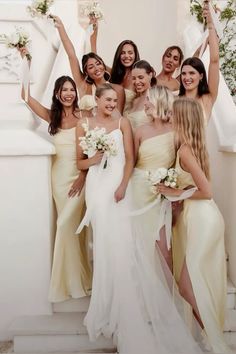 the bridesmaids are all dressed in yellow dresses