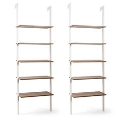 two white shelves with wooden shelves on each side