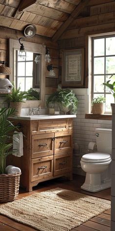 a bathroom with wooden floors and walls, including a white toilet next to a sink