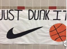 a banner that says just dunk it with a basketball on it and the words, just dunk it